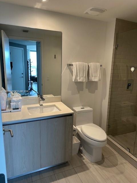 4010 South Ocean Drive, Unit R2702 Hollywood, FL 33019 - Photo 41 of 41 a bathroom with a sink toilet and shower
