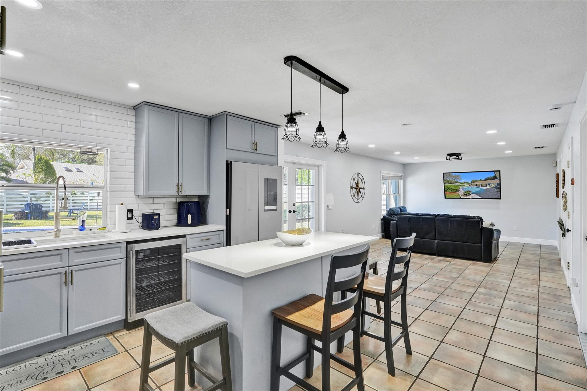 14930 Southwest 145th Street Miami, FL 33196 - Photo 17 of 94 Remodeled Kitchen and breakfast island