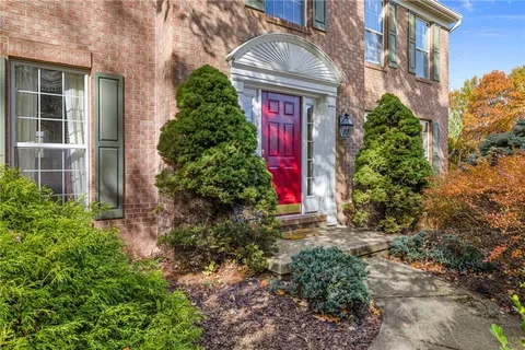 a front view of a multi story residential apartment building