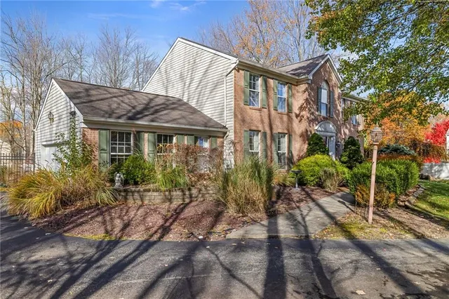a house view with a garden space