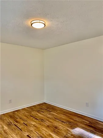 a view of a room with an empty space
