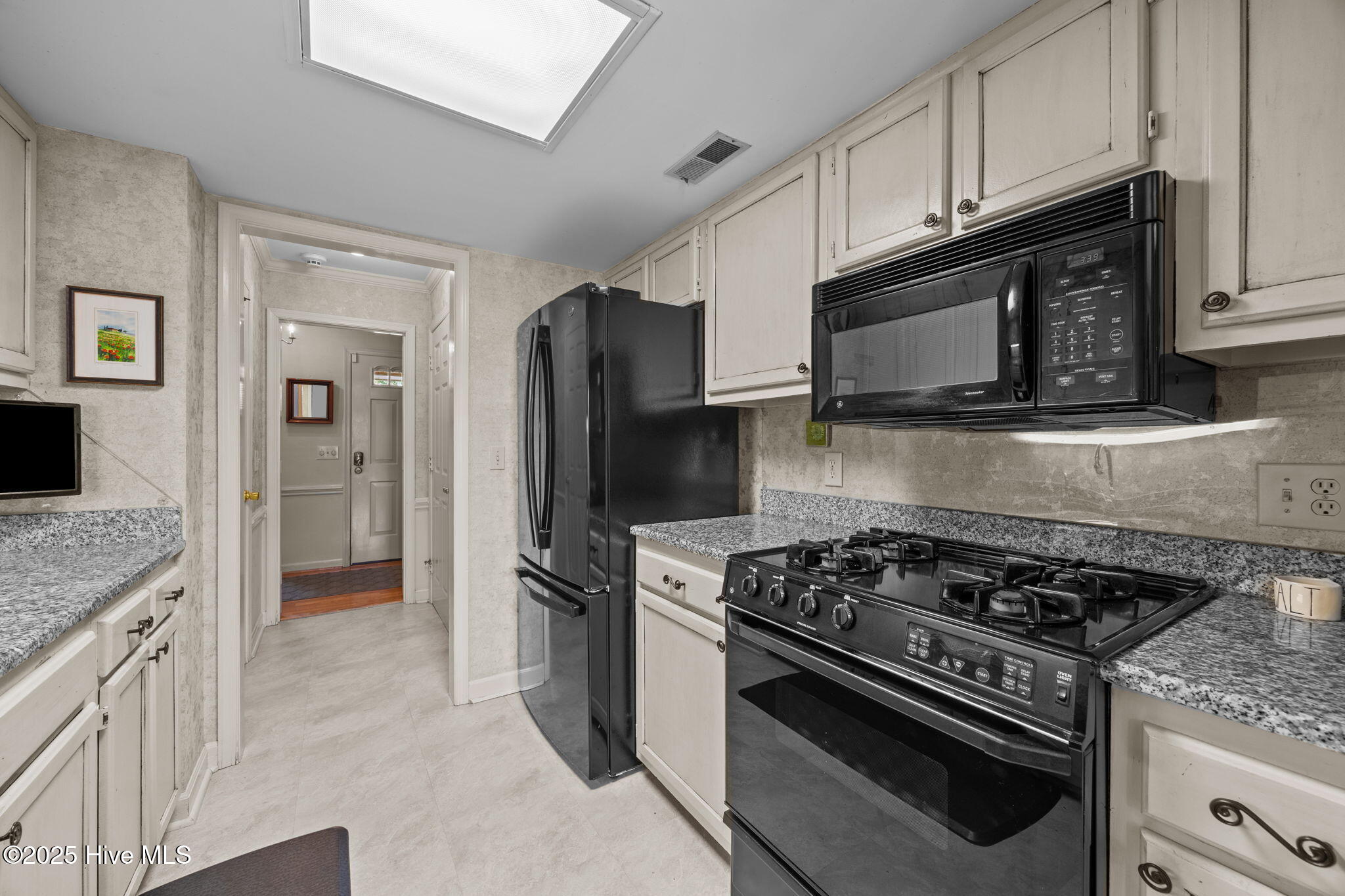 1874 Quail Ridge Road, Unit E Greenville, NC 27858 - Photo 17 of 55 Kitchen. Please note: the refrigerator and stove pictured do not convey.