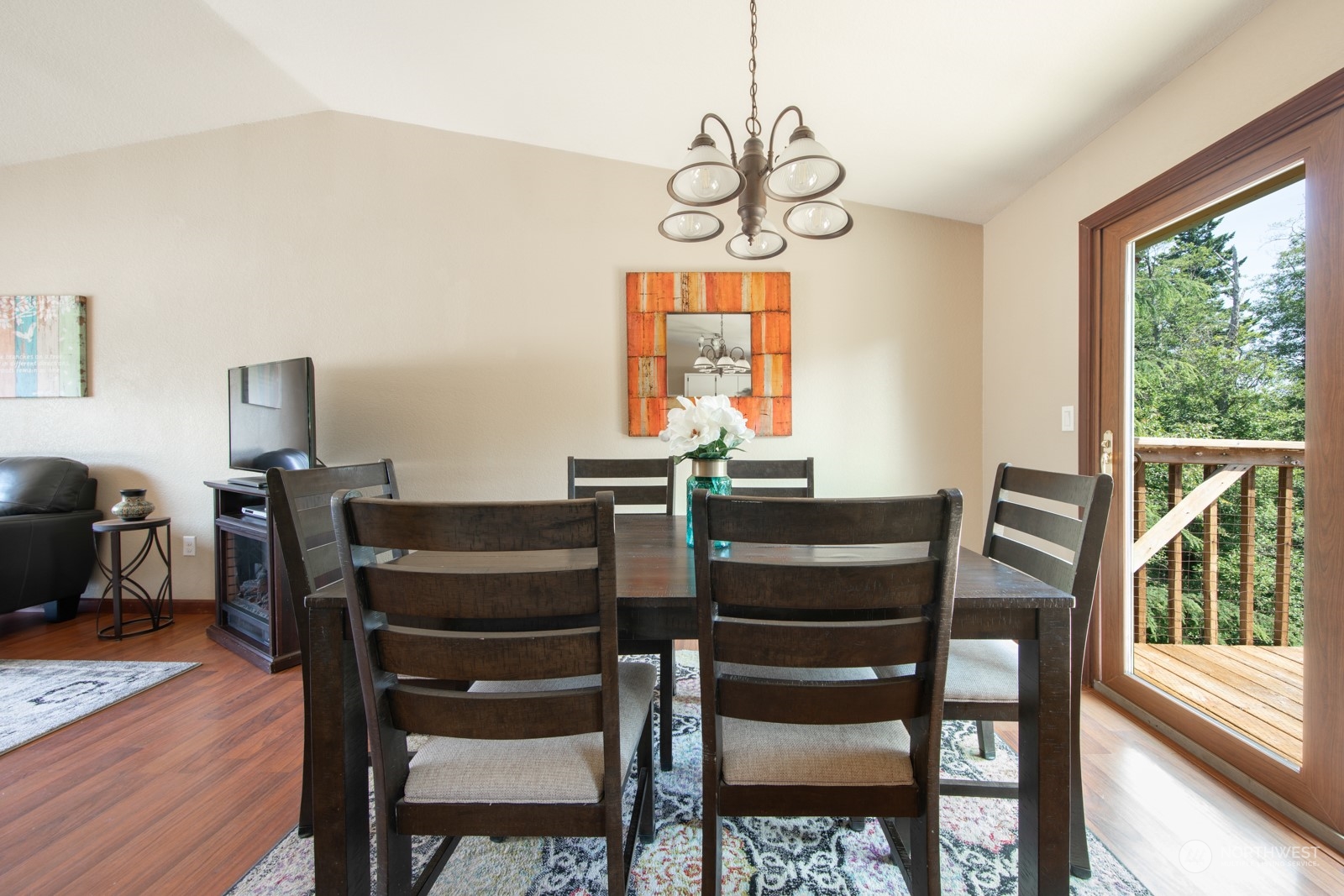 7715 Lower Ridge Road Everett, WA 98203 - Photo 13 of 30 a view of a dining room with furniture window and wooden floor