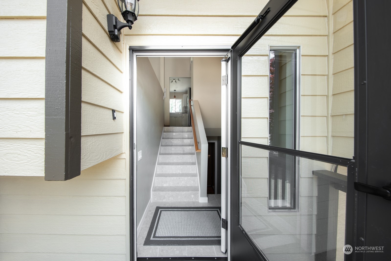 7715 Lower Ridge Road Everett, WA 98203 - Photo 6 of 30 a view of staircase with white walls and windows