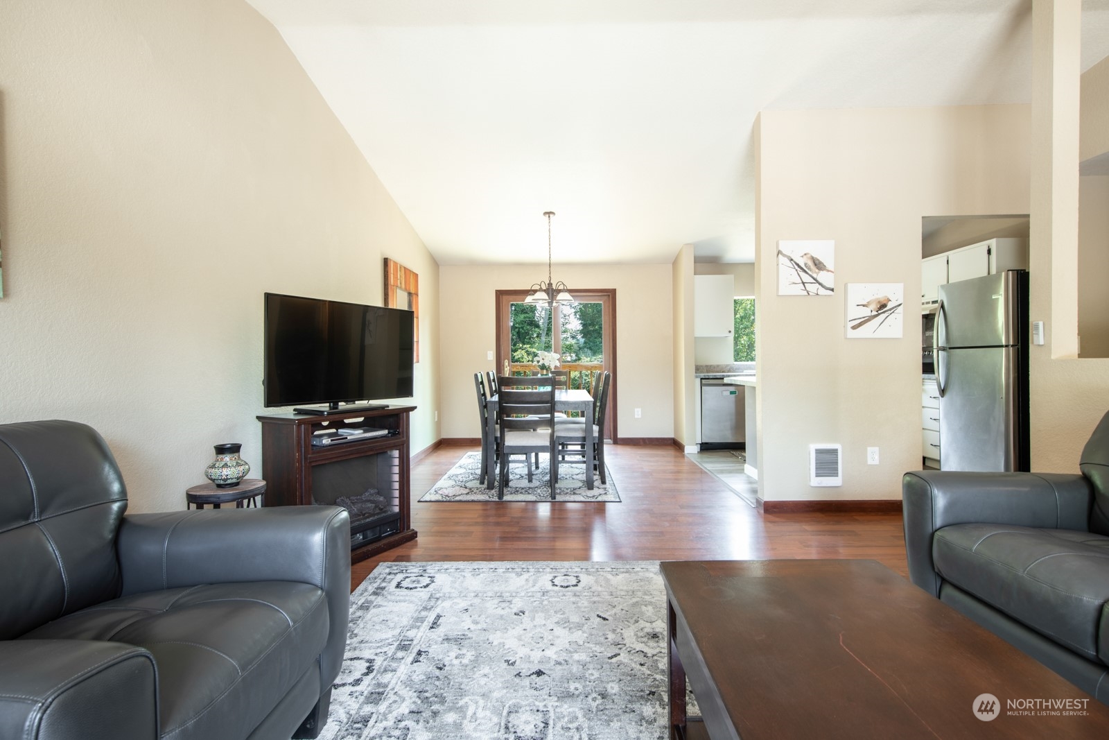 7715 Lower Ridge Road Everett, WA 98203 - Photo 10 of 30 a living room with furniture and a flat screen tv
