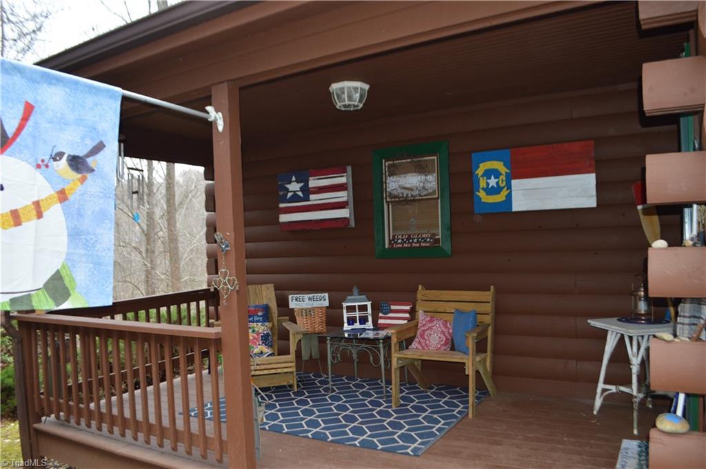 551 Jackson Rd Extension Mount Airy, NC 27030 - Photo 4 of 49 Log Cabin on the River with a guest house!