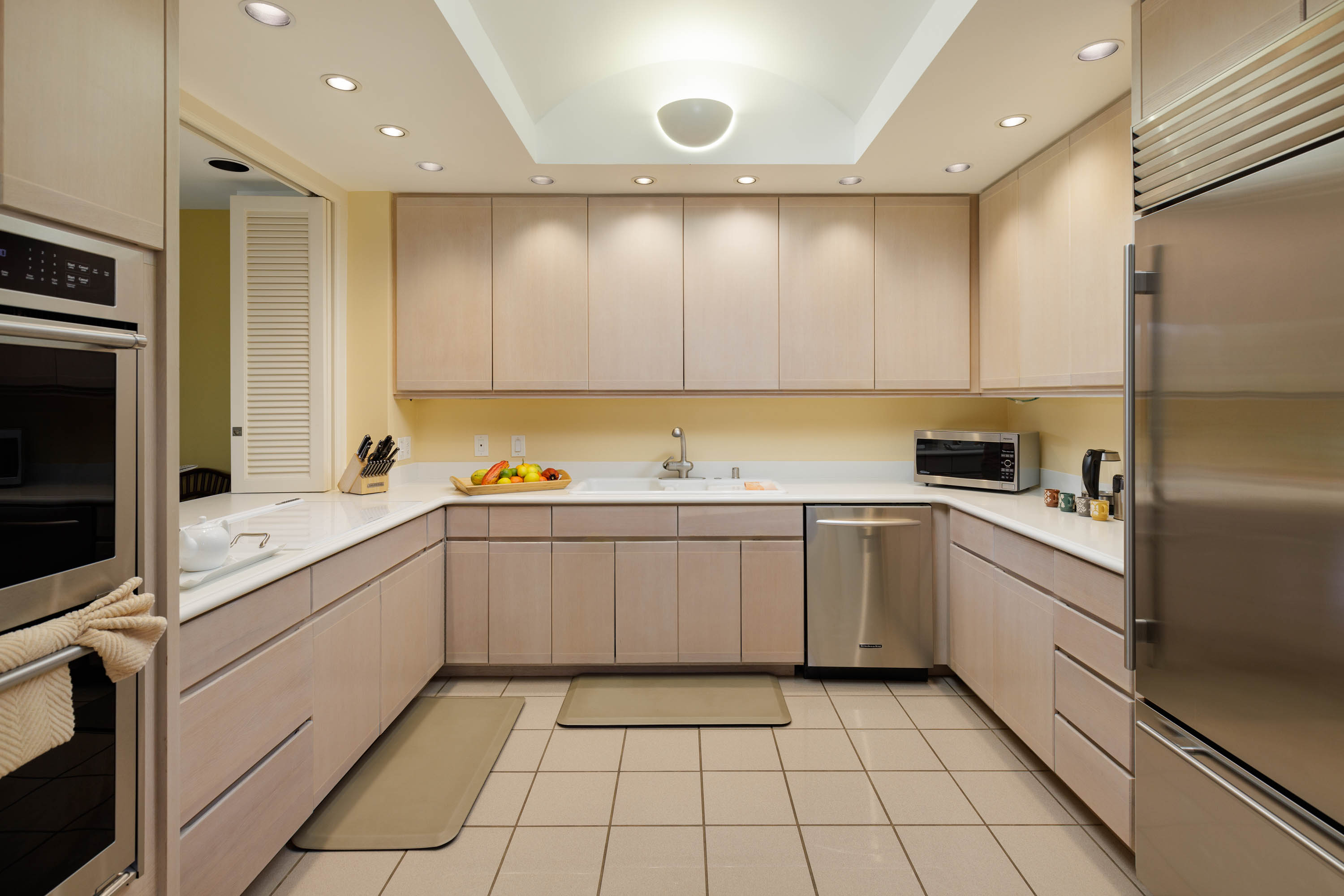 68-1375 Pauoa Road, Unit D3 Kamuela, HI 96743 - Photo 16 of 30 a kitchen with a sink window and stainless steel appliances