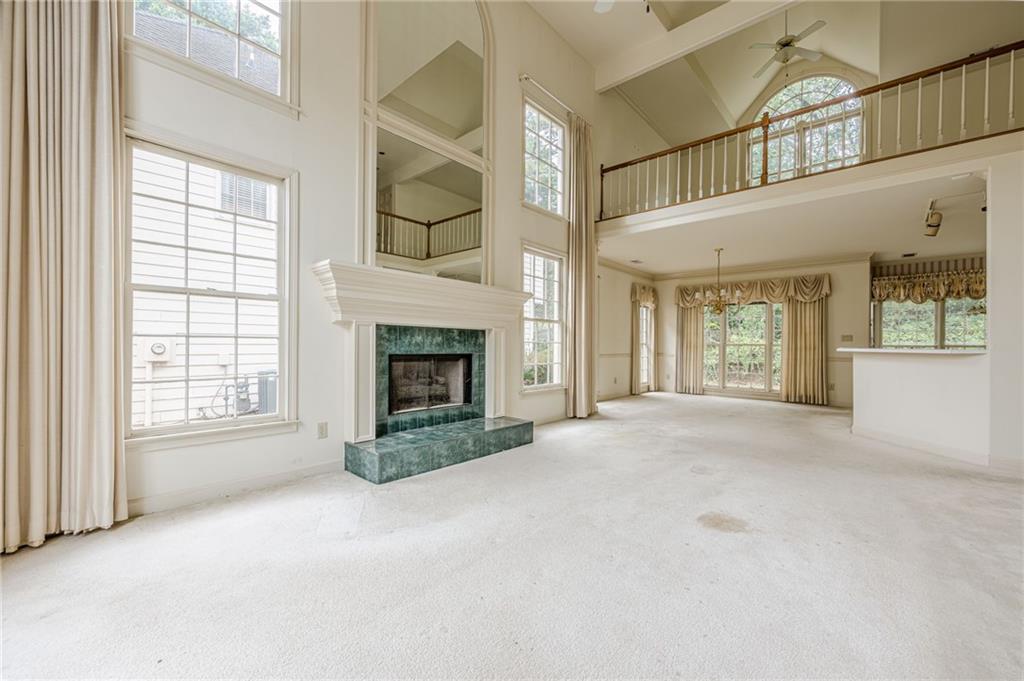 2404 Watermark Decatur, GA 30033 - Photo 1 of 1 an empty room with windows and fireplace