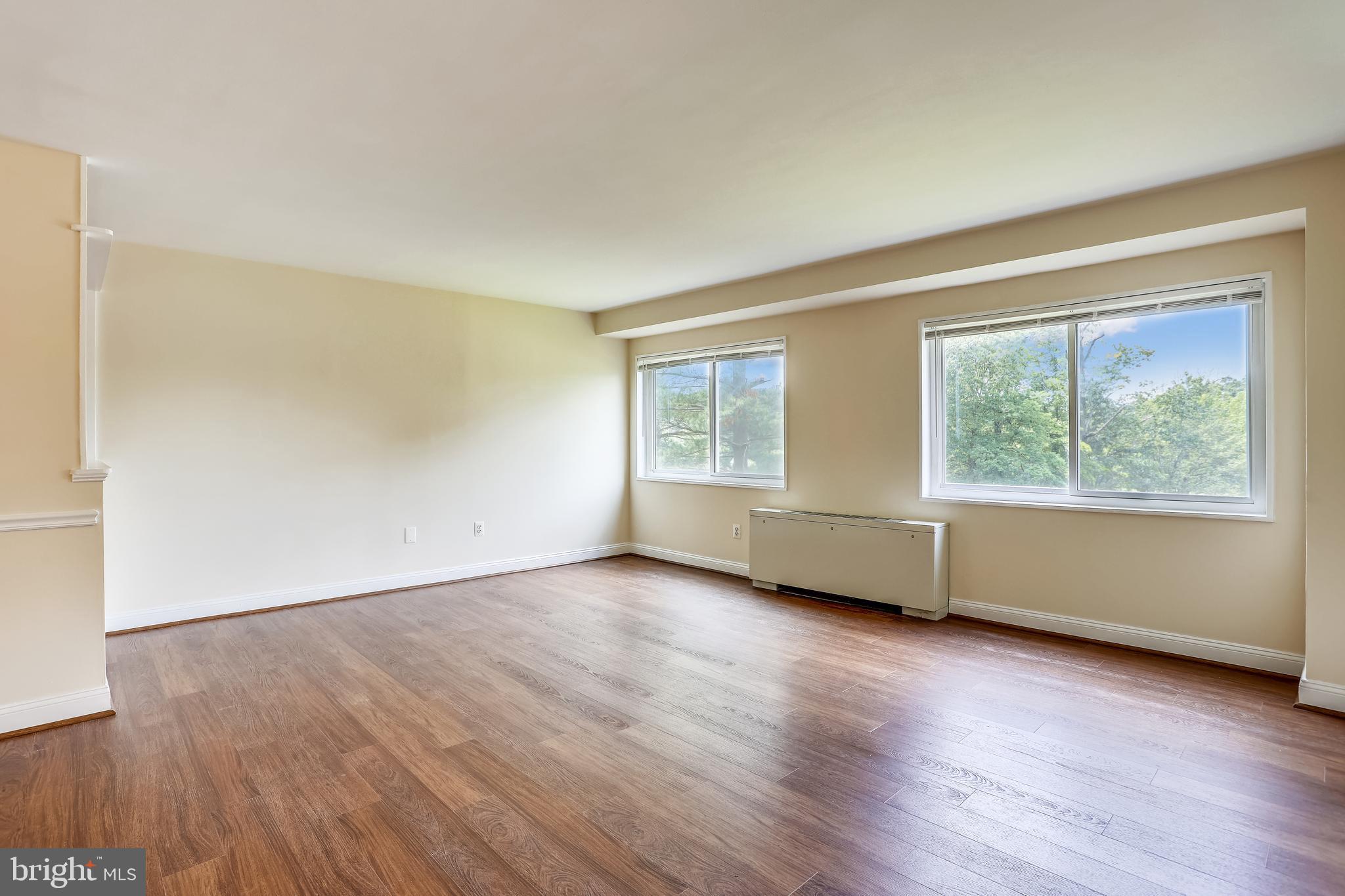 1111 University Boulevard West, Unit 208 Silver Spring, MD 20902 - Photo 4 of 61 Living Room with New Windows and Convector