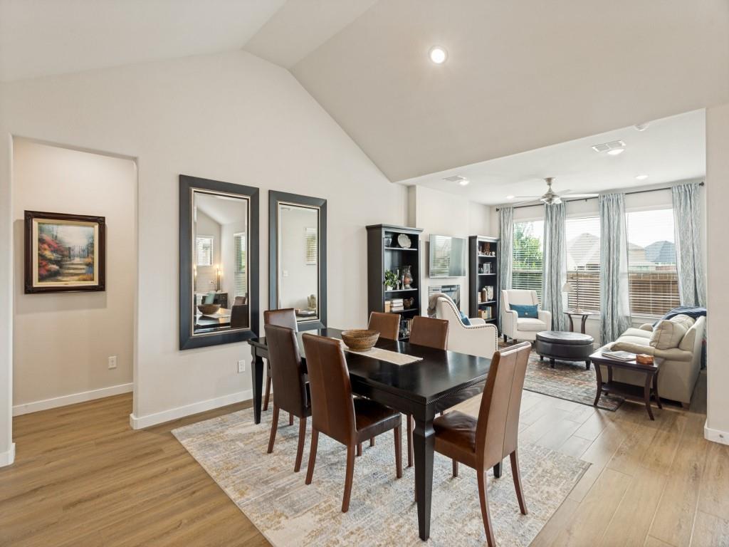 10613 Smiths Bnd Road Fort Worth, TX 76126 - Photo 9 of 29 Vaulted ceiling dining area featuring wood-finish flooring