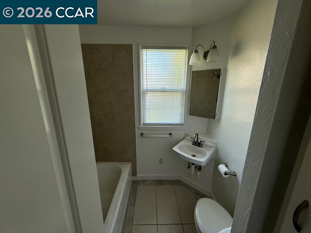 1830 Scott Road Concord, CA 94519 - Photo 8 of 12 a bathroom with a sink toilet and window
