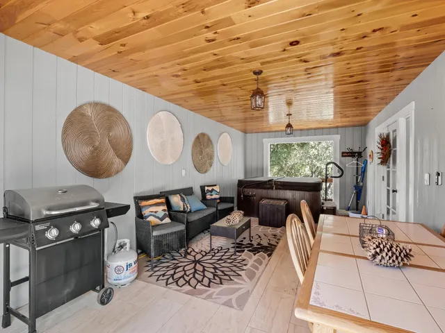 a kitchen with stainless steel appliances a refrigerator and a stove top oven