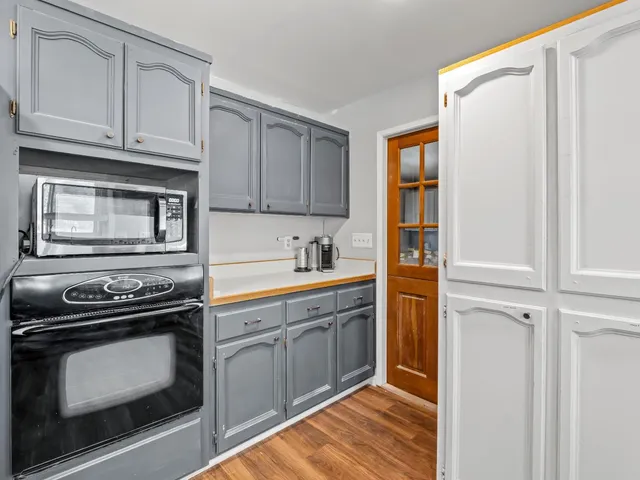 aerial view of a house with a big yard