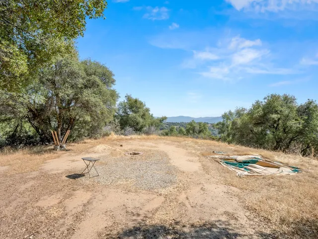 a front view of a house with parking space