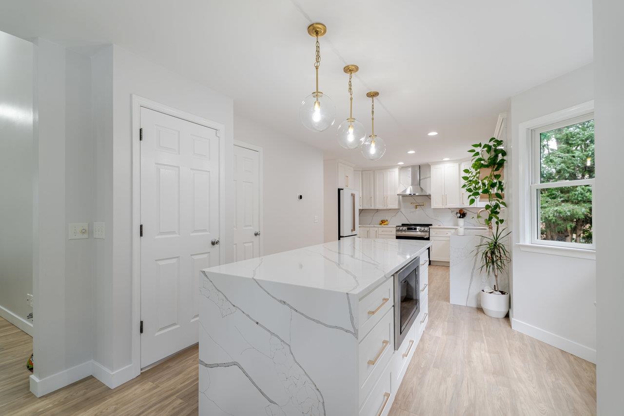 1271 King Edwards Way Harrisonburg, VA 22801 - Photo 14 of 75 a large white kitchen with a large window a oven and white appliances
