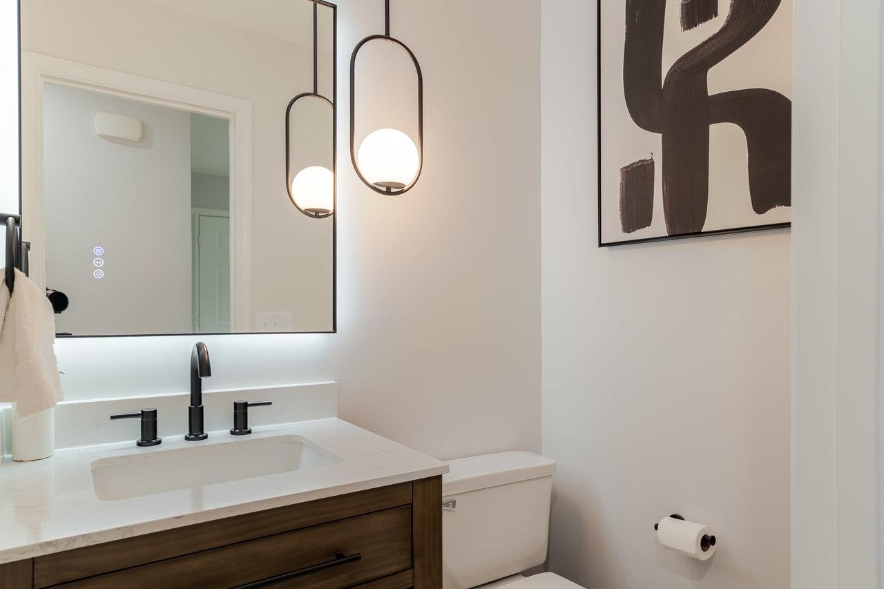1271 King Edwards Way Harrisonburg, VA 22801 - Photo 34 of 75 a bathroom with a sink vanity mirror and toilet