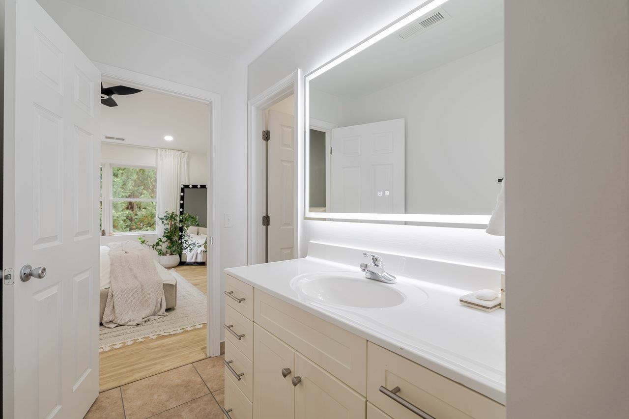 1271 King Edwards Way Harrisonburg, VA 22801 - Photo 44 of 75 a bathroom with a sink and a mirror