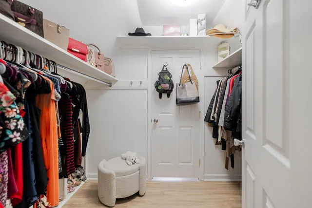 an aerial view of residential house with outdoor space and swimming pool