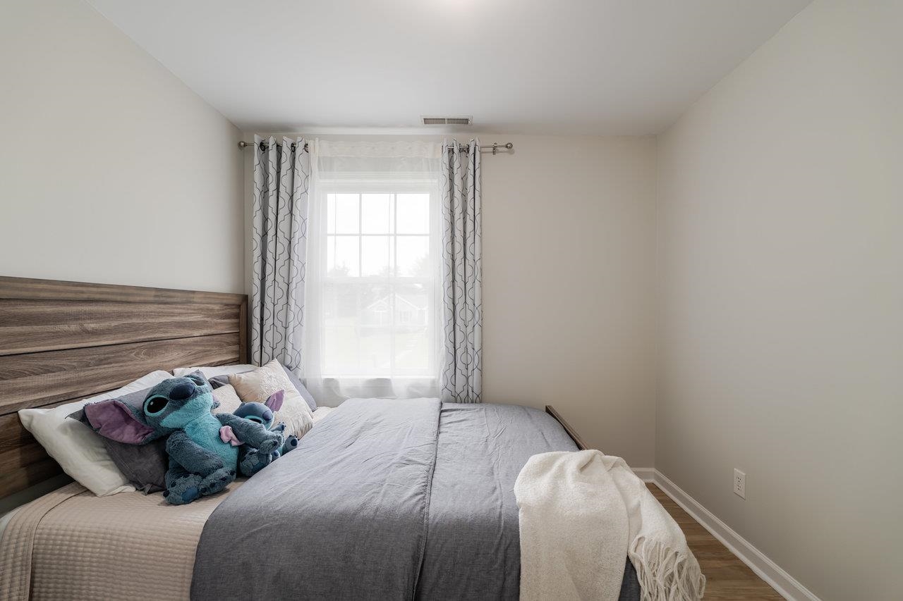 1271 King Edwards Way Harrisonburg, VA 22801 - Photo 60 of 75 a bedroom with a bed and a window