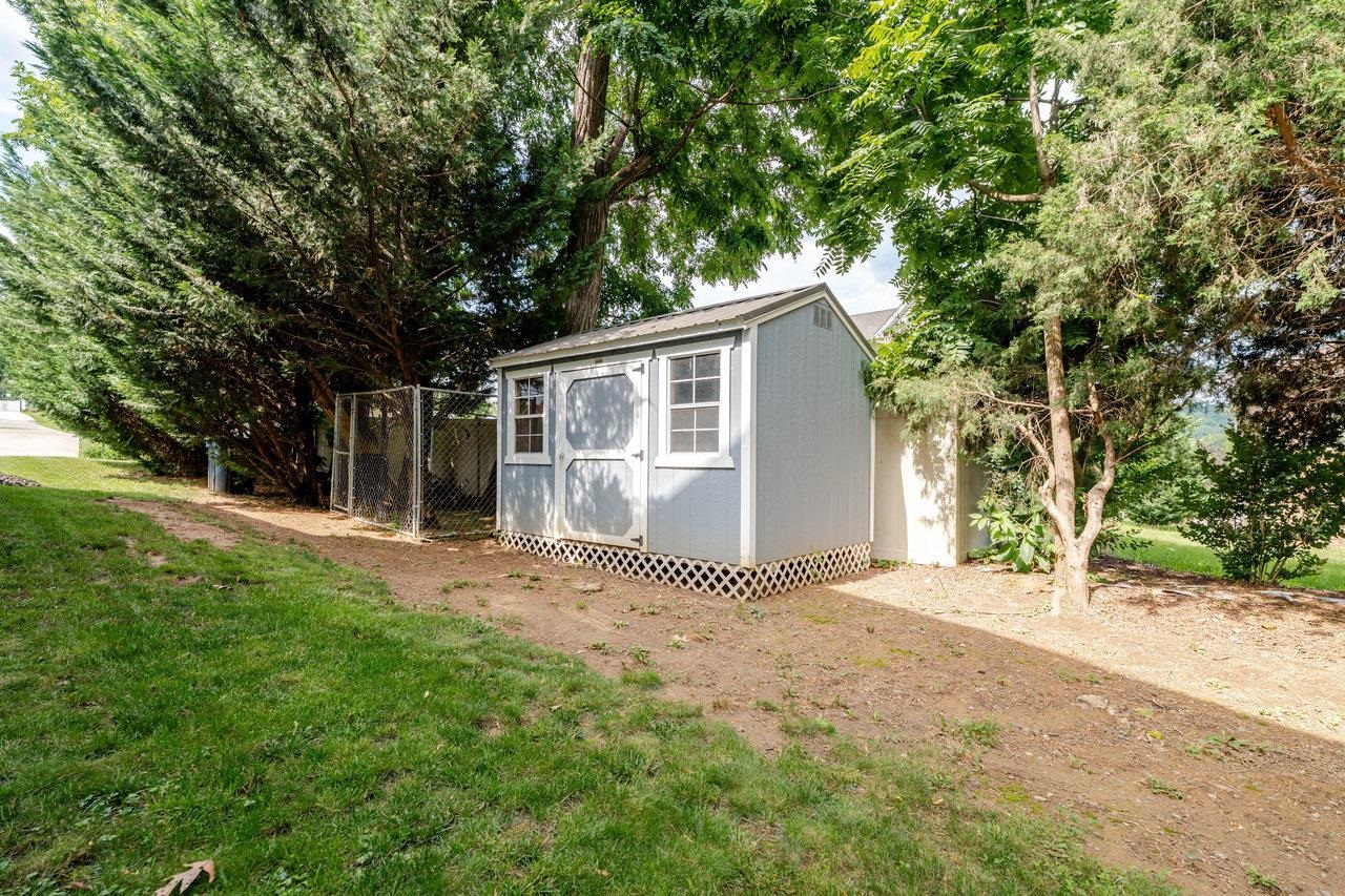 1271 King Edwards Way Harrisonburg, VA 22801 - Photo 73 of 75 a view of a house with a yard and large tree