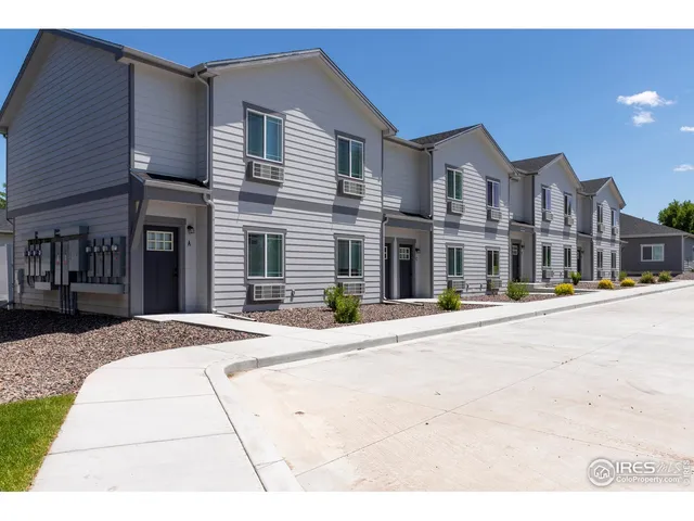 a view of a building with a street
