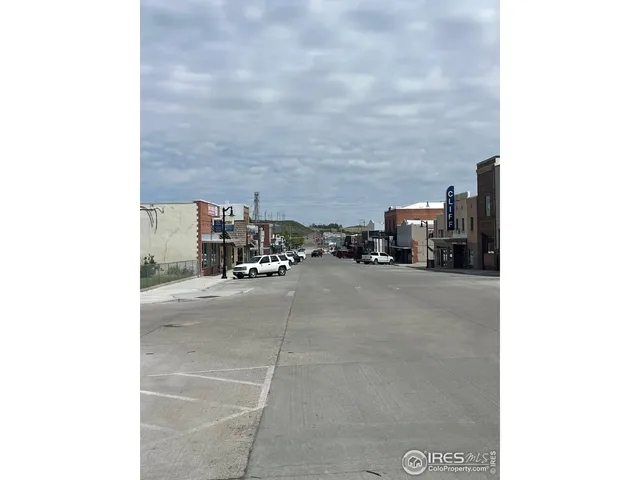 a view of building with truck parked