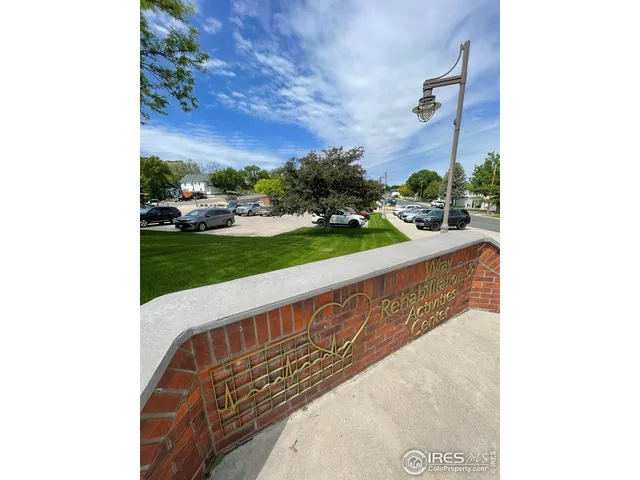 a view of balcony with yard