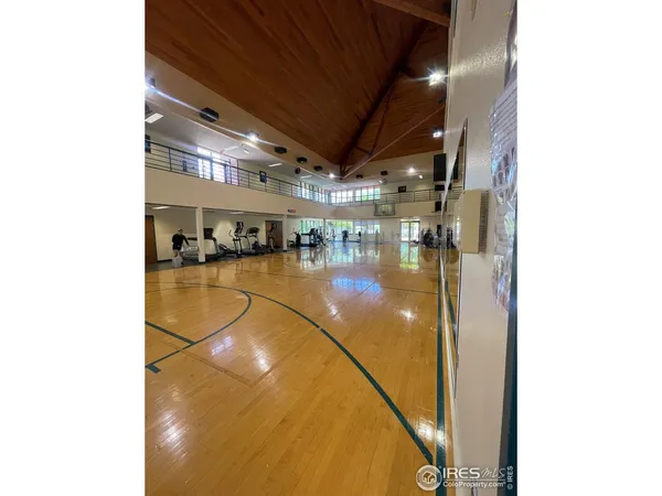 a view of a swimming pool with sitting area