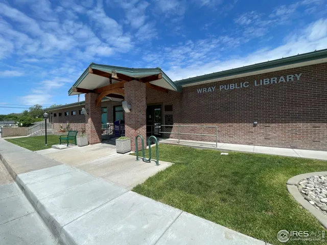 a view of a house with a park