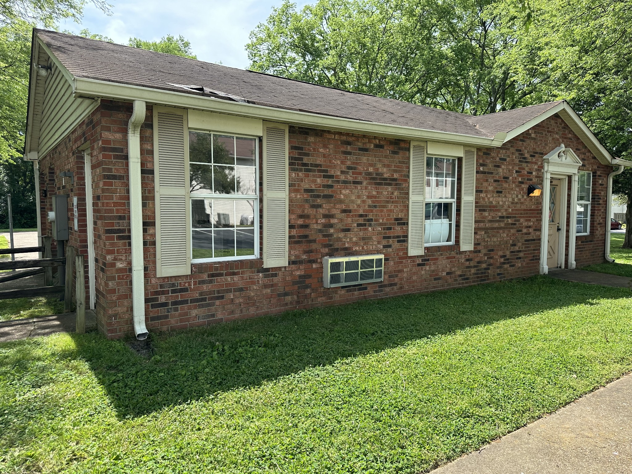 1301 Neelys Bend Road, Unit 52 Madison, TN 37115 - Photo 14 of 16 front view of a house with a yard