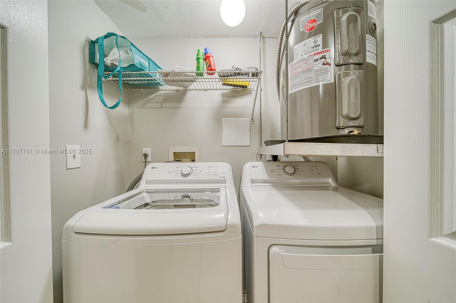 8888 Collins Avenue, Unit 201 Surfside, FL 33154 - Photo 11 of 37 a bathroom with a sink and a mirror