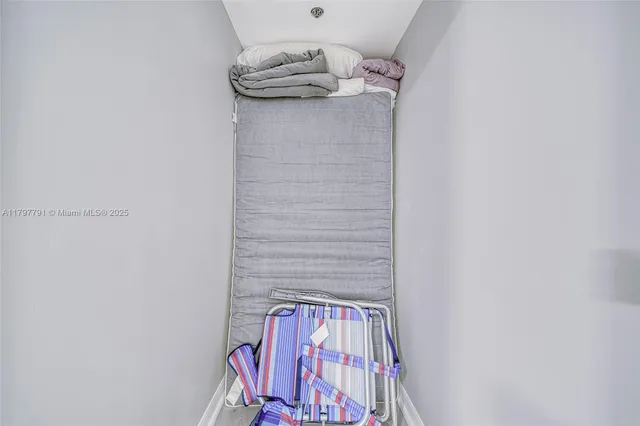 a bathroom with a double vanity sink and mirror with shower