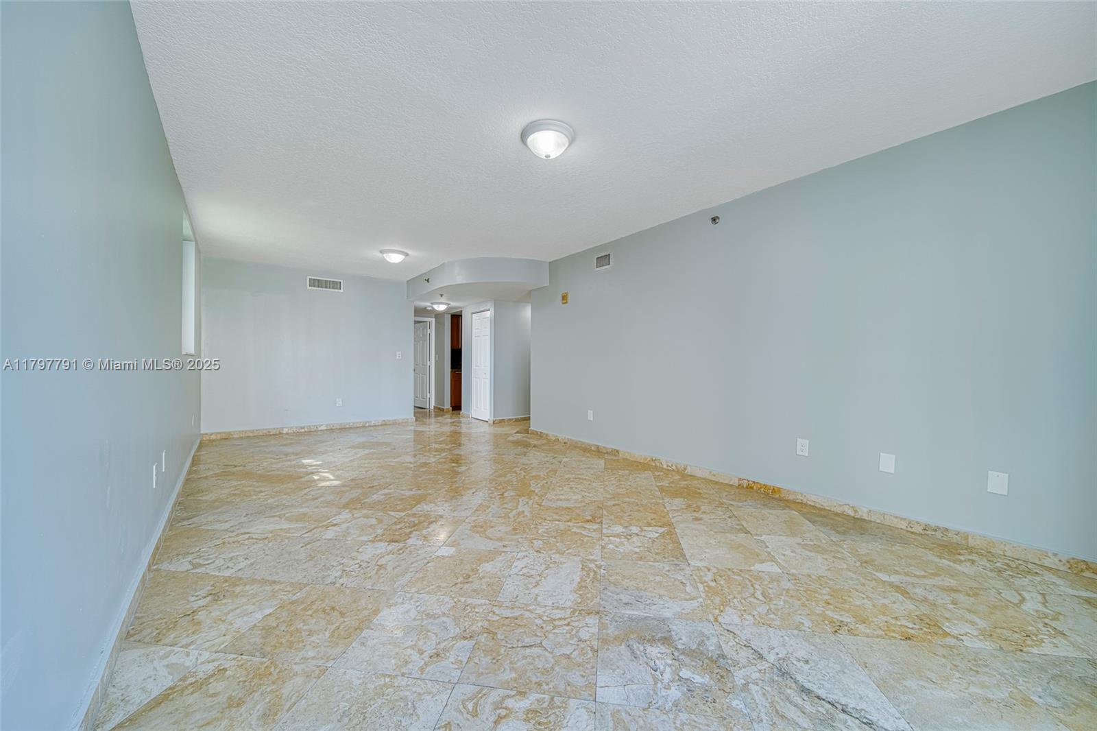 8888 Collins Avenue, Unit 201 Surfside, FL 33154 - Photo 26 of 37 a view of an empty room