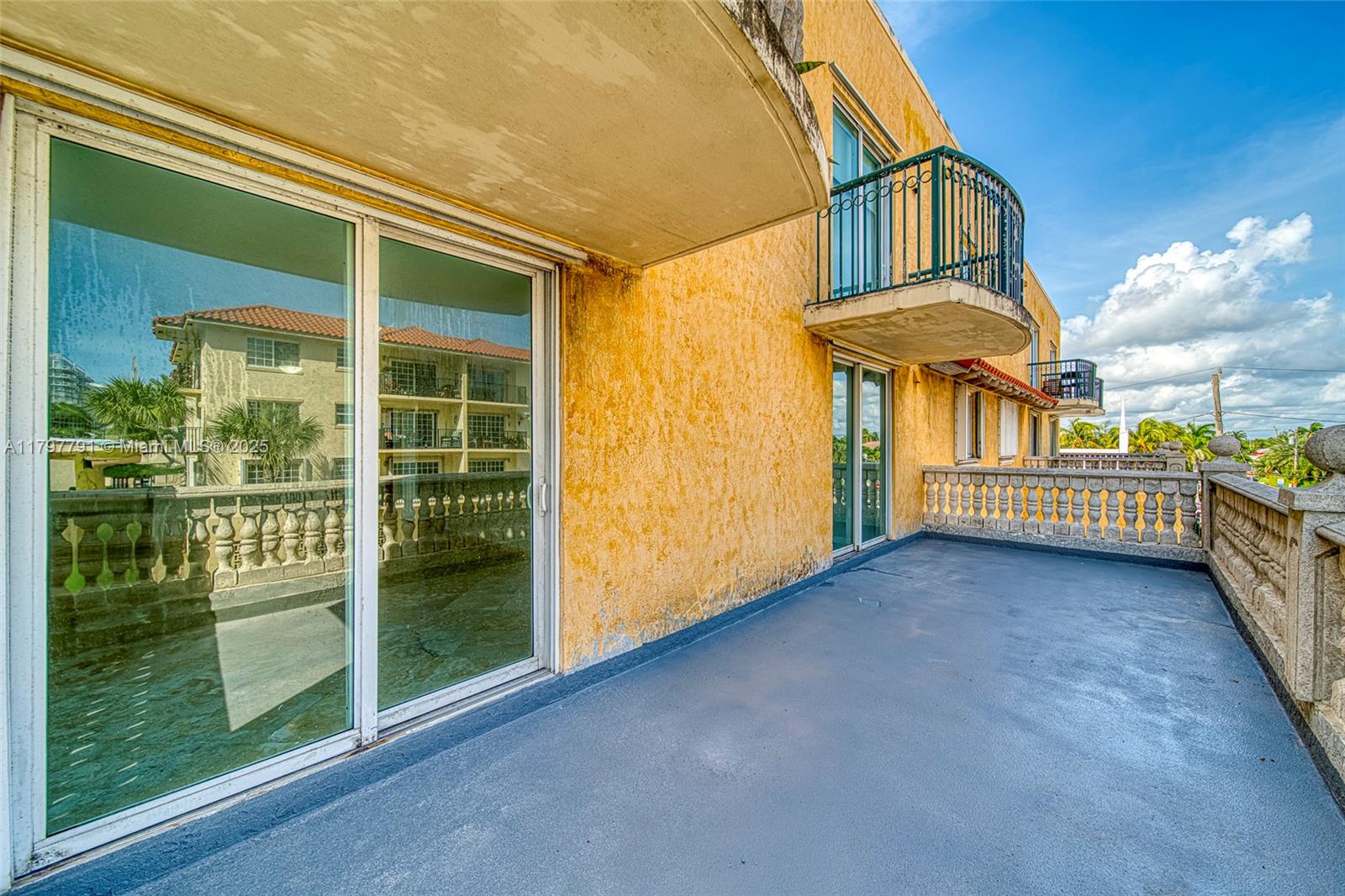 8888 Collins Avenue, Unit 201 Surfside, FL 33154 - Photo 27 of 37 a view of a balcony with door