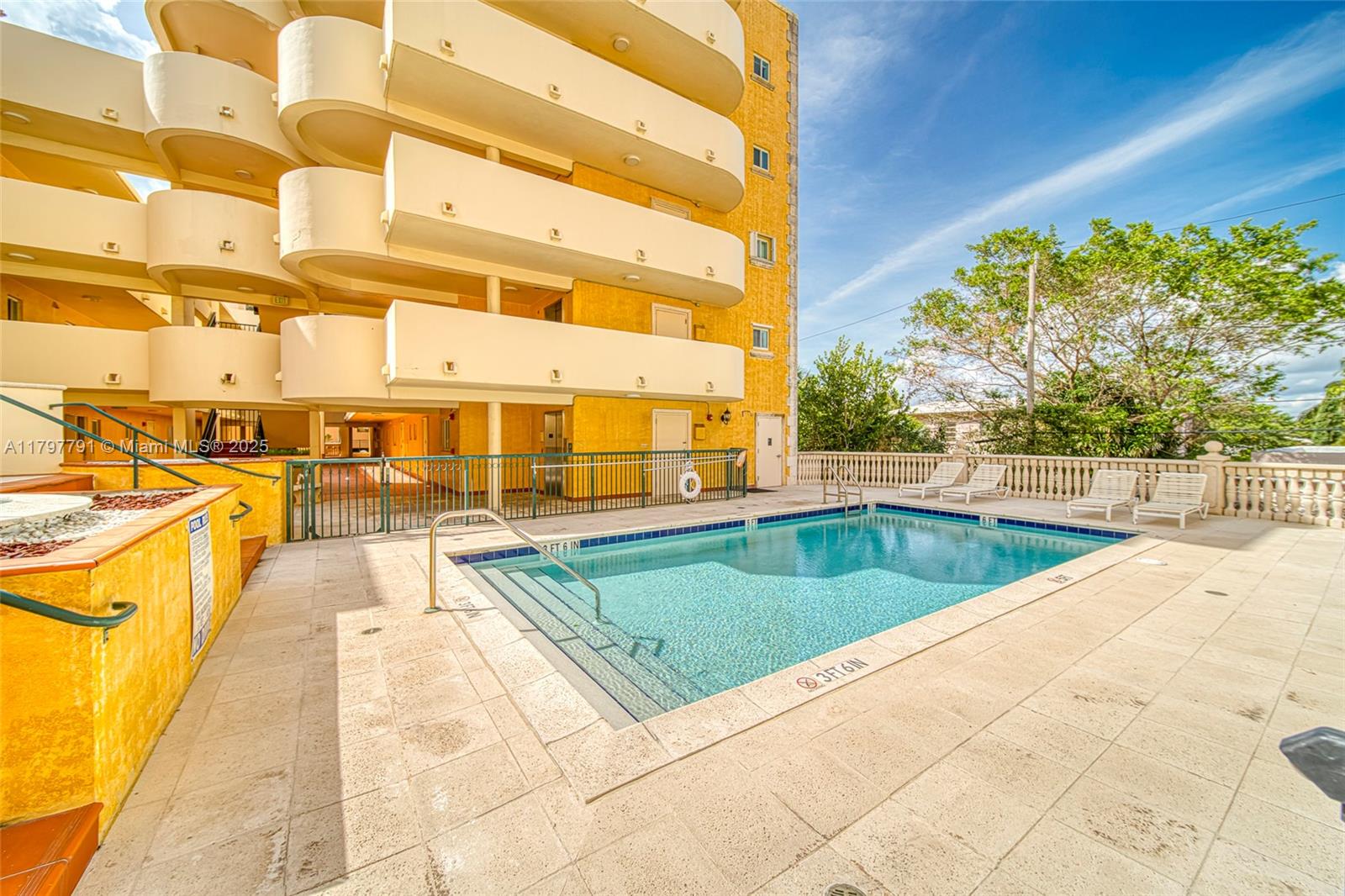 8888 Collins Avenue, Unit 201 Surfside, FL 33154 - Photo 31 of 37 a view of swimming pool with chairs
