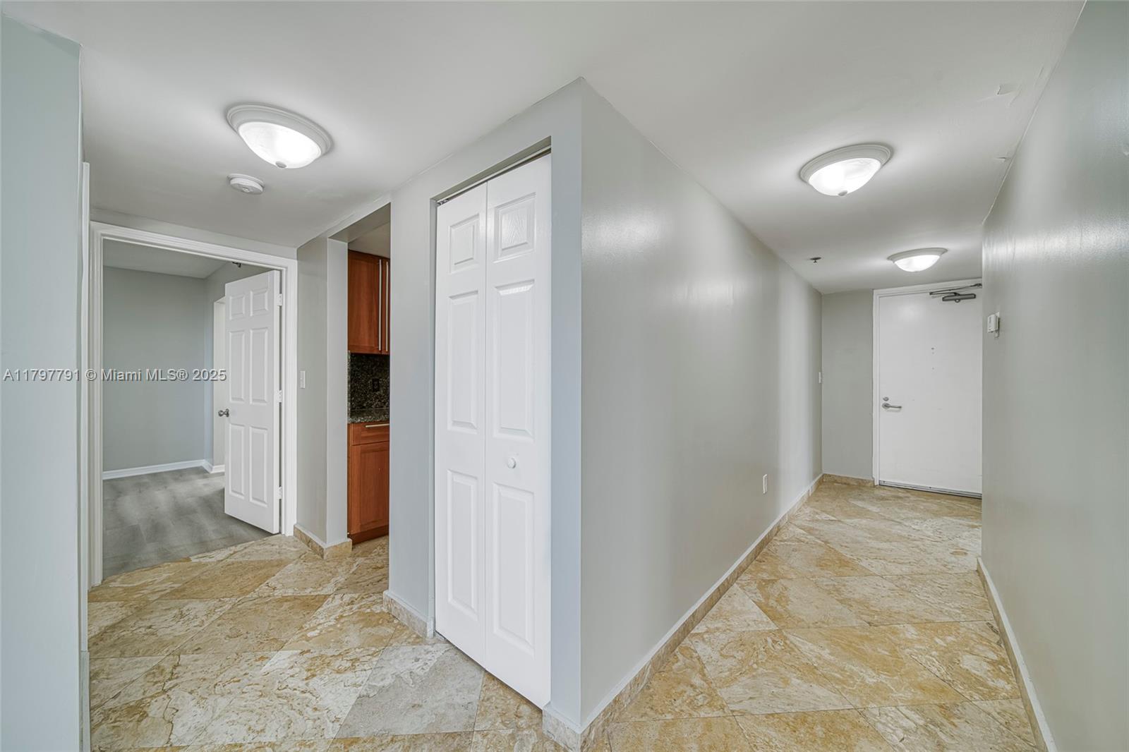 8888 Collins Avenue, Unit 201 Surfside, FL 33154 - Photo 9 of 37 a view of a hallway