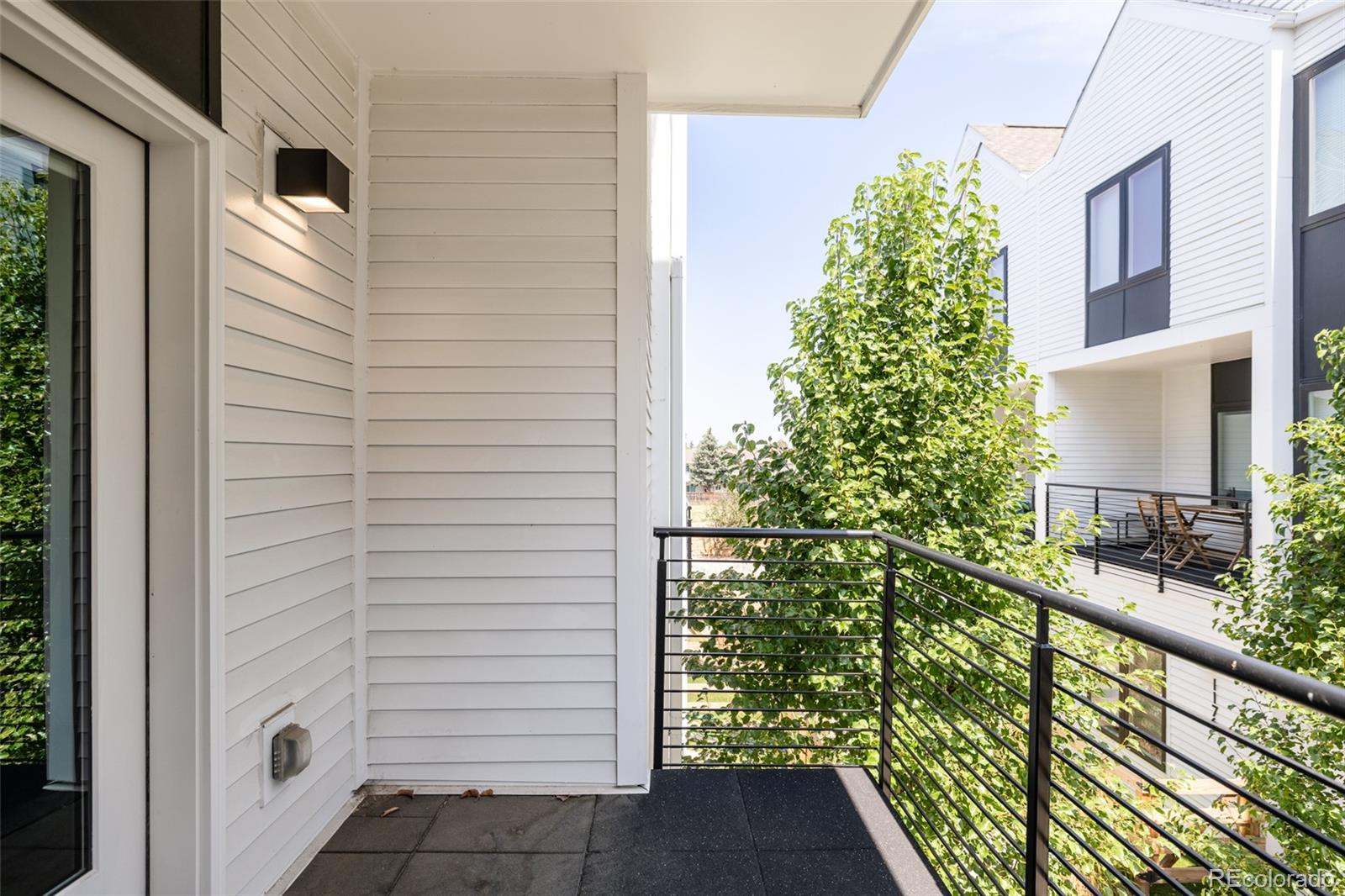 1179 South Reed Street Lakewood, CO 80232 - Photo 12 of 27 a view of a balcony with a plant
