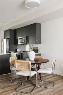 a view of a dining room with furniture