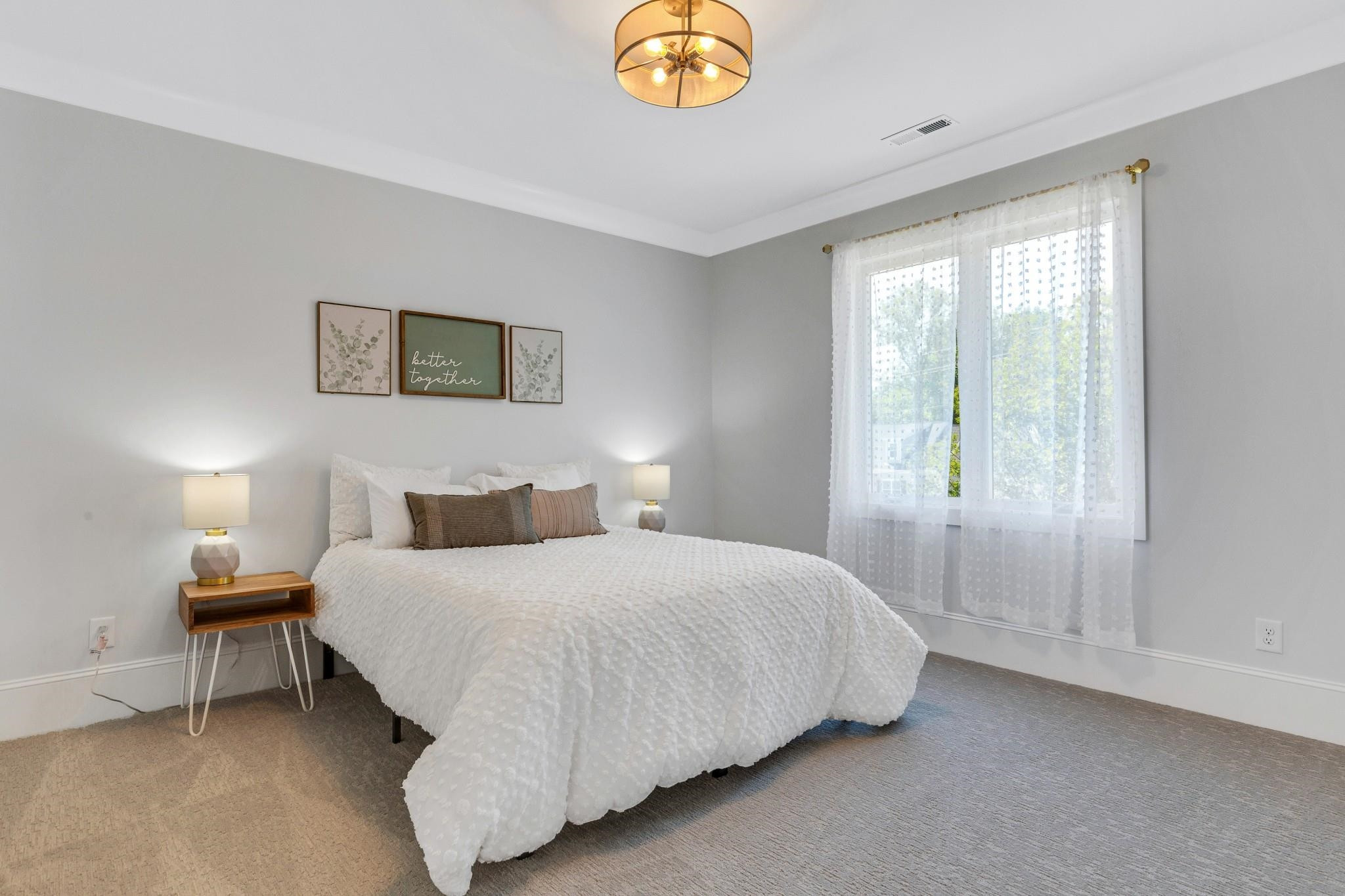 115 Crestview Road Raleigh, NC 27609 - Photo 24 of 42 a bedroom with a bed and a window
