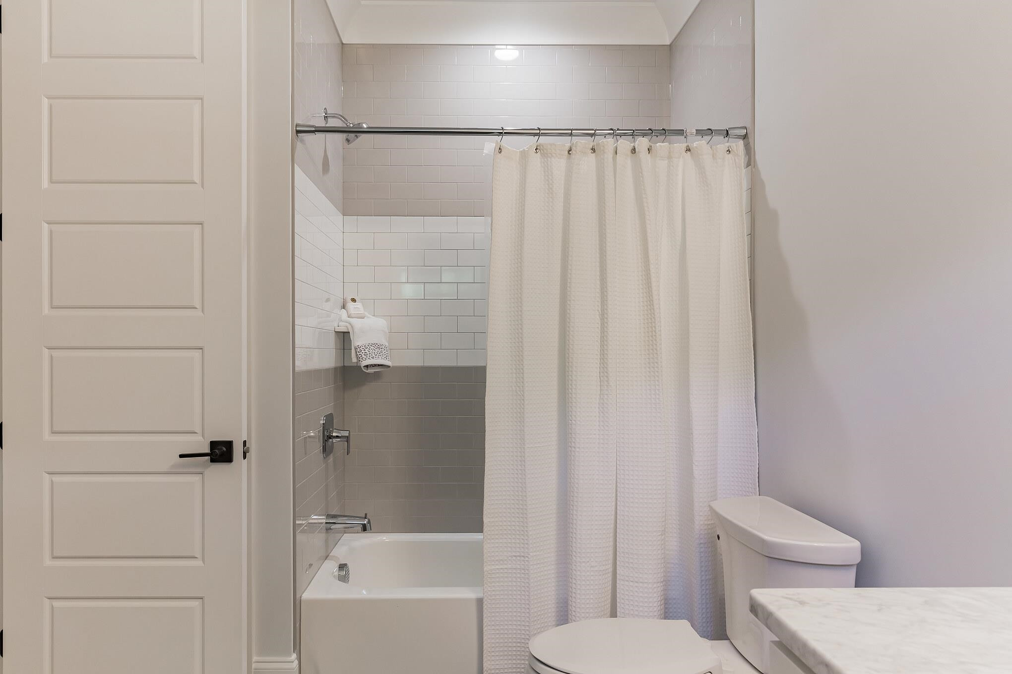 115 Crestview Road Raleigh, NC 27609 - Photo 26 of 42 a bathroom with a toilet and a shower