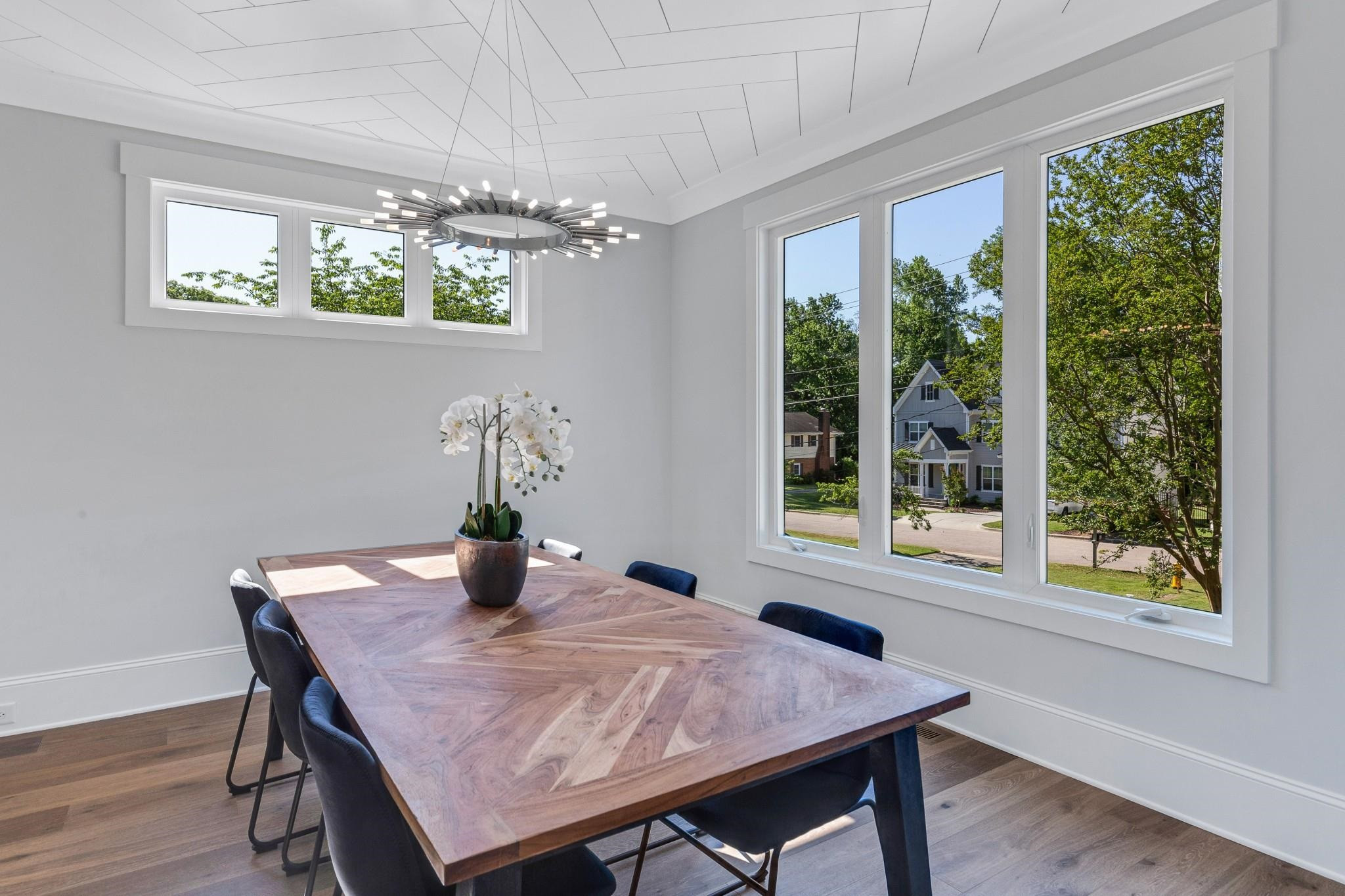 115 Crestview Road Raleigh, NC 27609 - Photo 9 of 42 a dining room with furniture and window