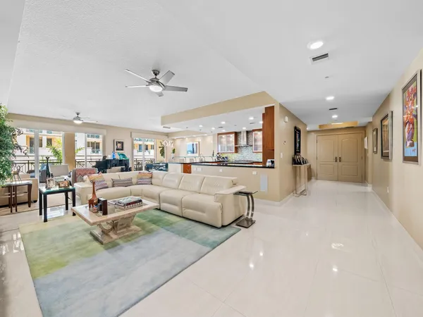 a living room with furniture and white walls