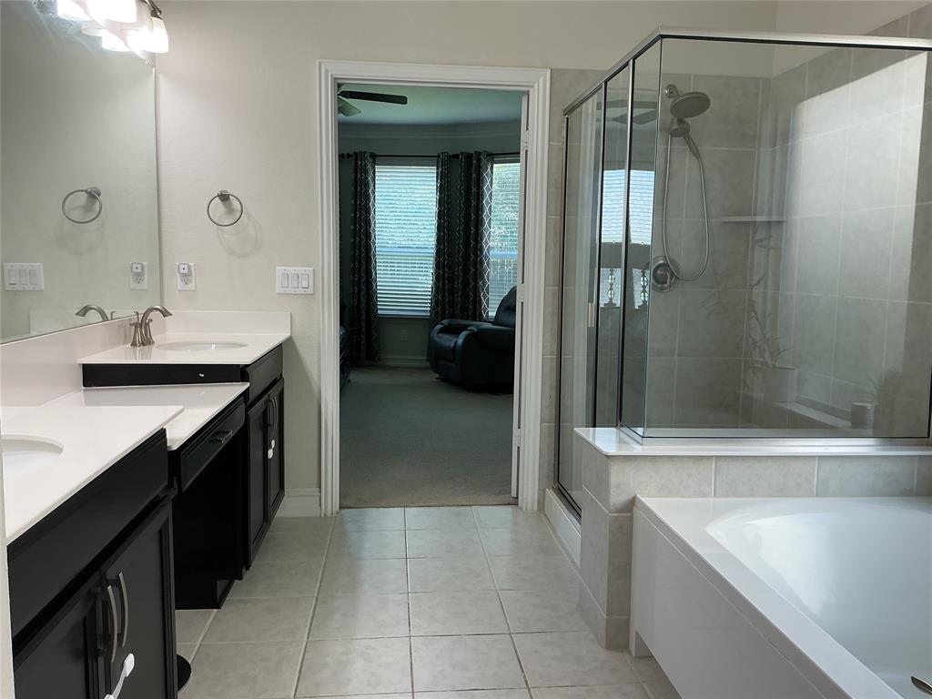 2344 Candler Club Way Little Elm, TX 75068 - Photo 13 of 14 a kitchen with a sink and a refrigerator