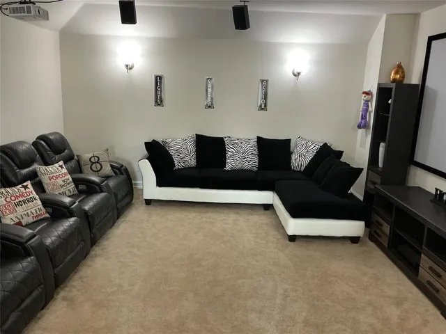 a kitchen with a sink cabinets and stainless steel appliances