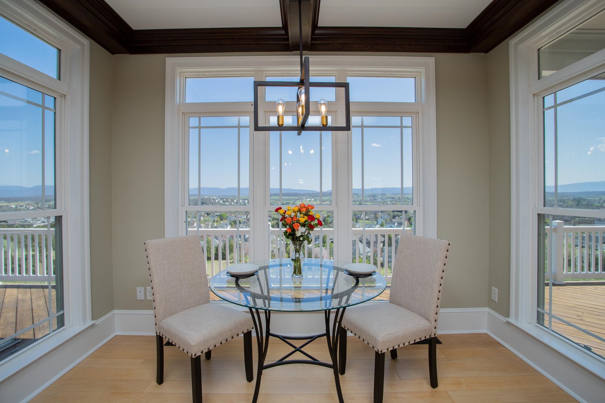 243 Barrenridge Road Fishersville, VA 22939 - Photo 37 of 75 a view of a dining room with furniture wooden floor and a chandelier