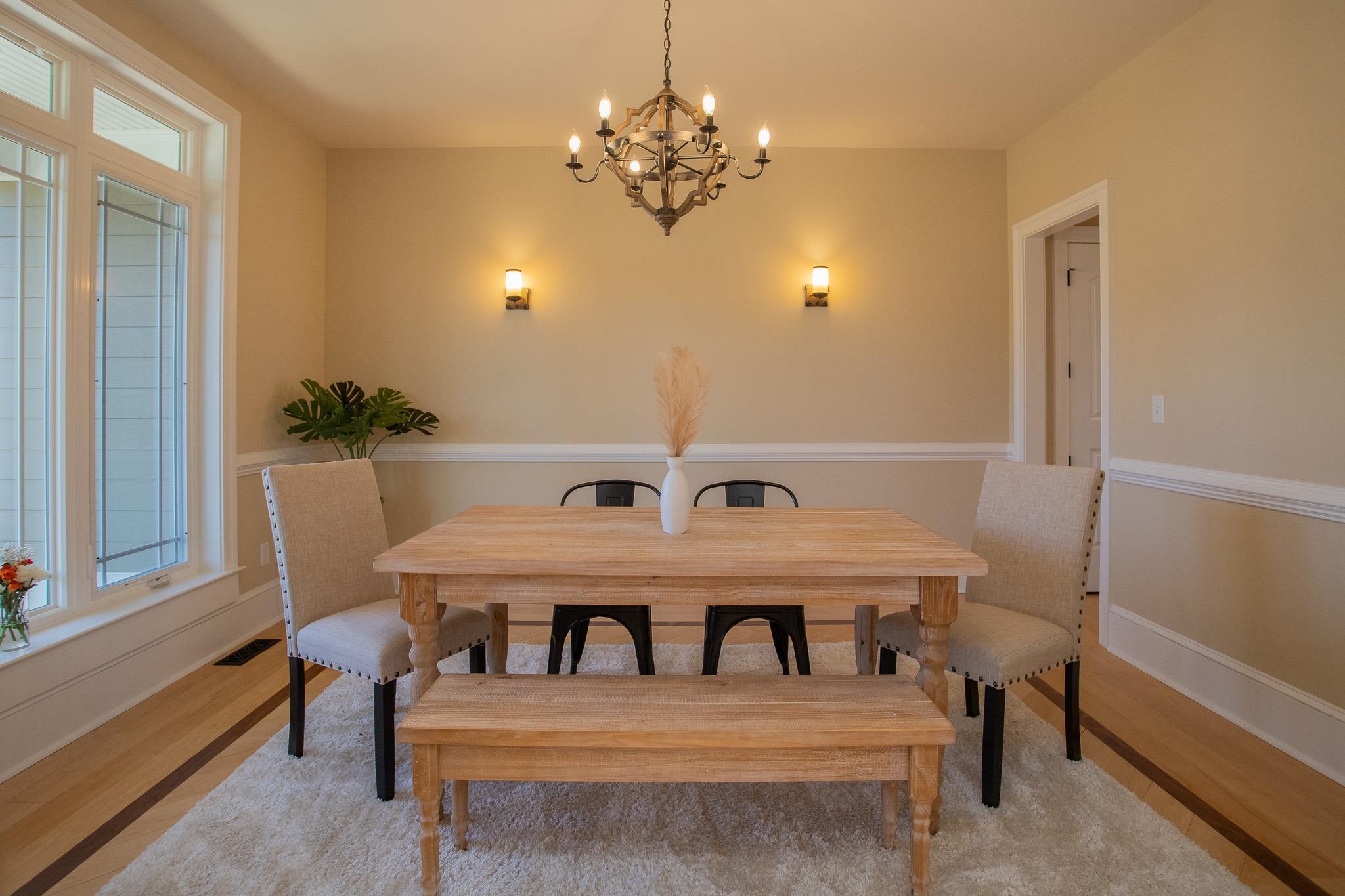 243 Barrenridge Road Fishersville, VA 22939 - Photo 41 of 75 a view of a dining room with furniture and a chandelier