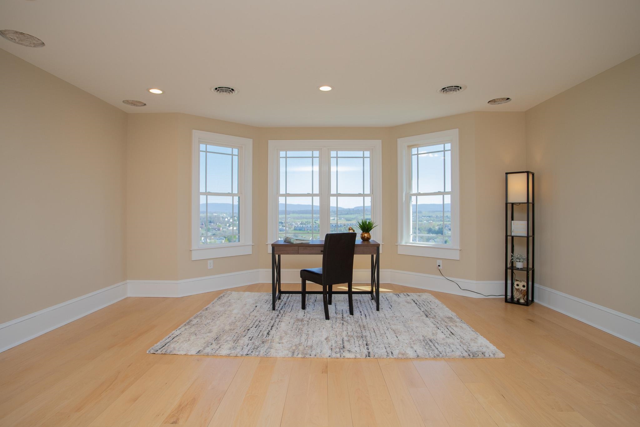 243 Barrenridge Road Fishersville, VA 22939 - Photo 51 of 75 a living room with furniture a dining table and a large window