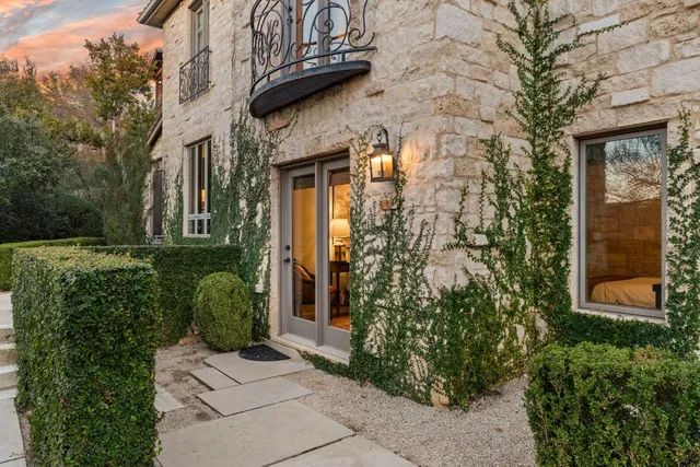 a view of a building with a garden