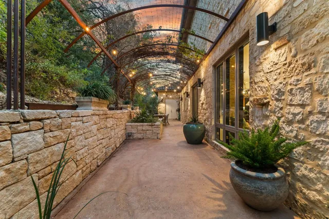 a view of a backyard with sitting area