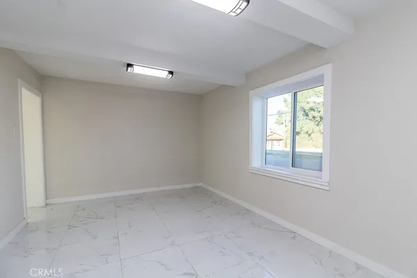 an empty room with a window
